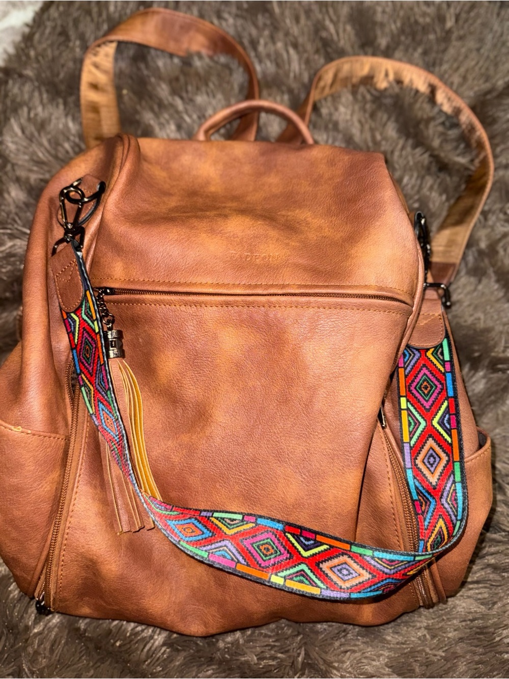 Tan Leather Backpack with Colorful Strap